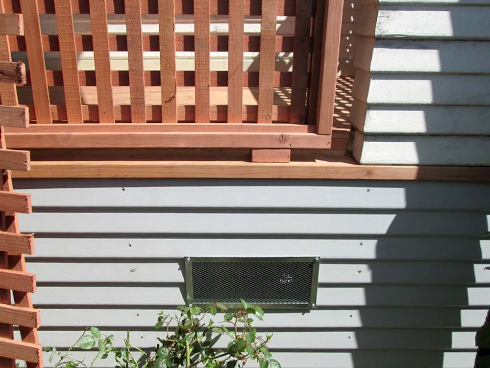 A house with a wooden fence and a window