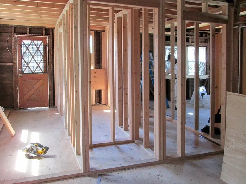 A room that is being built with wooden frames